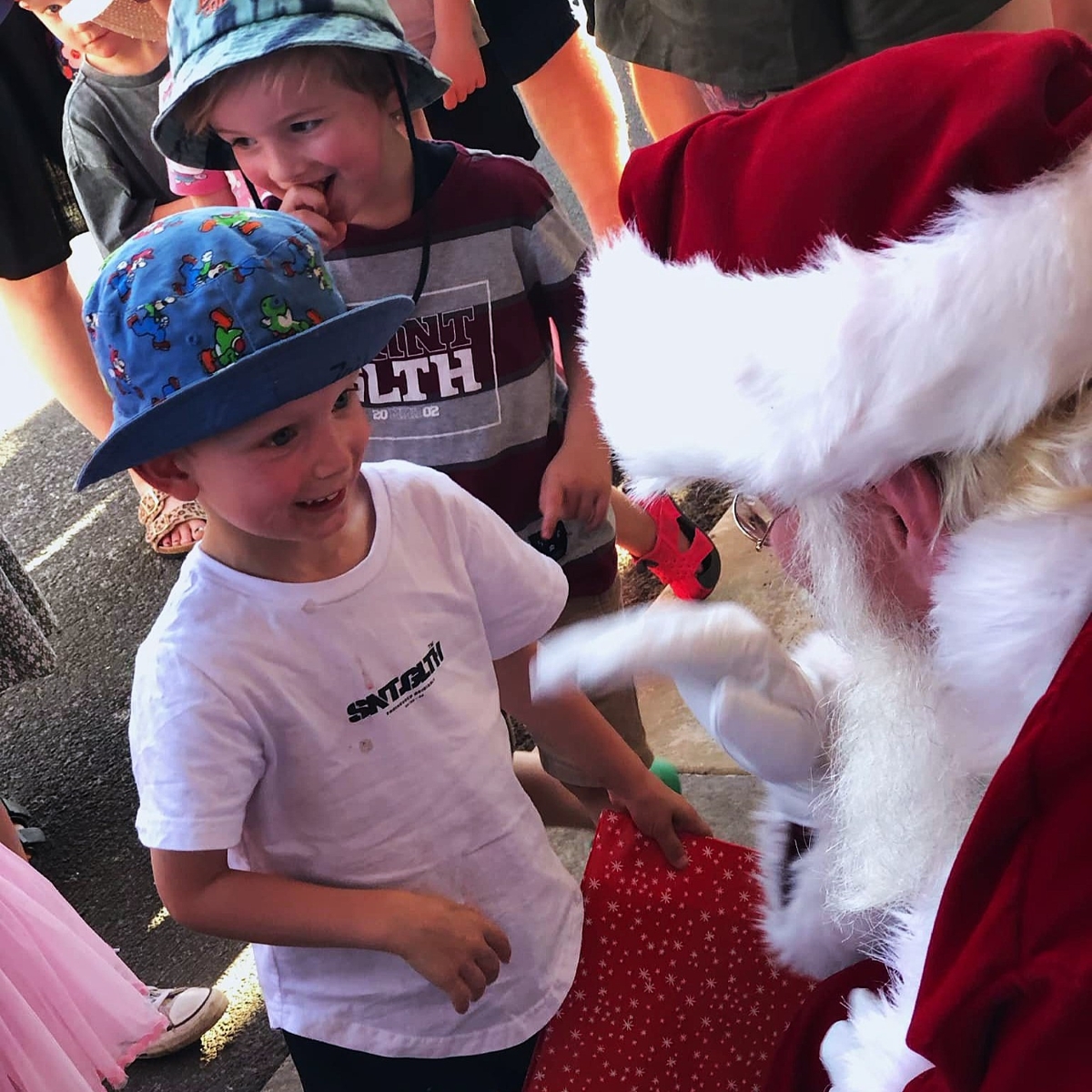 Santa greeting children